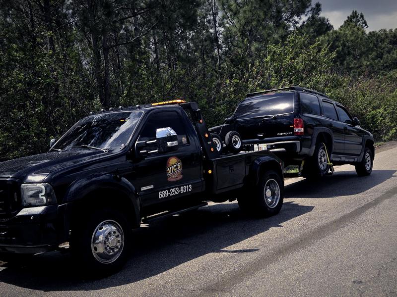An SUV recovered onto the road on a wooded route outside Kissimmee.